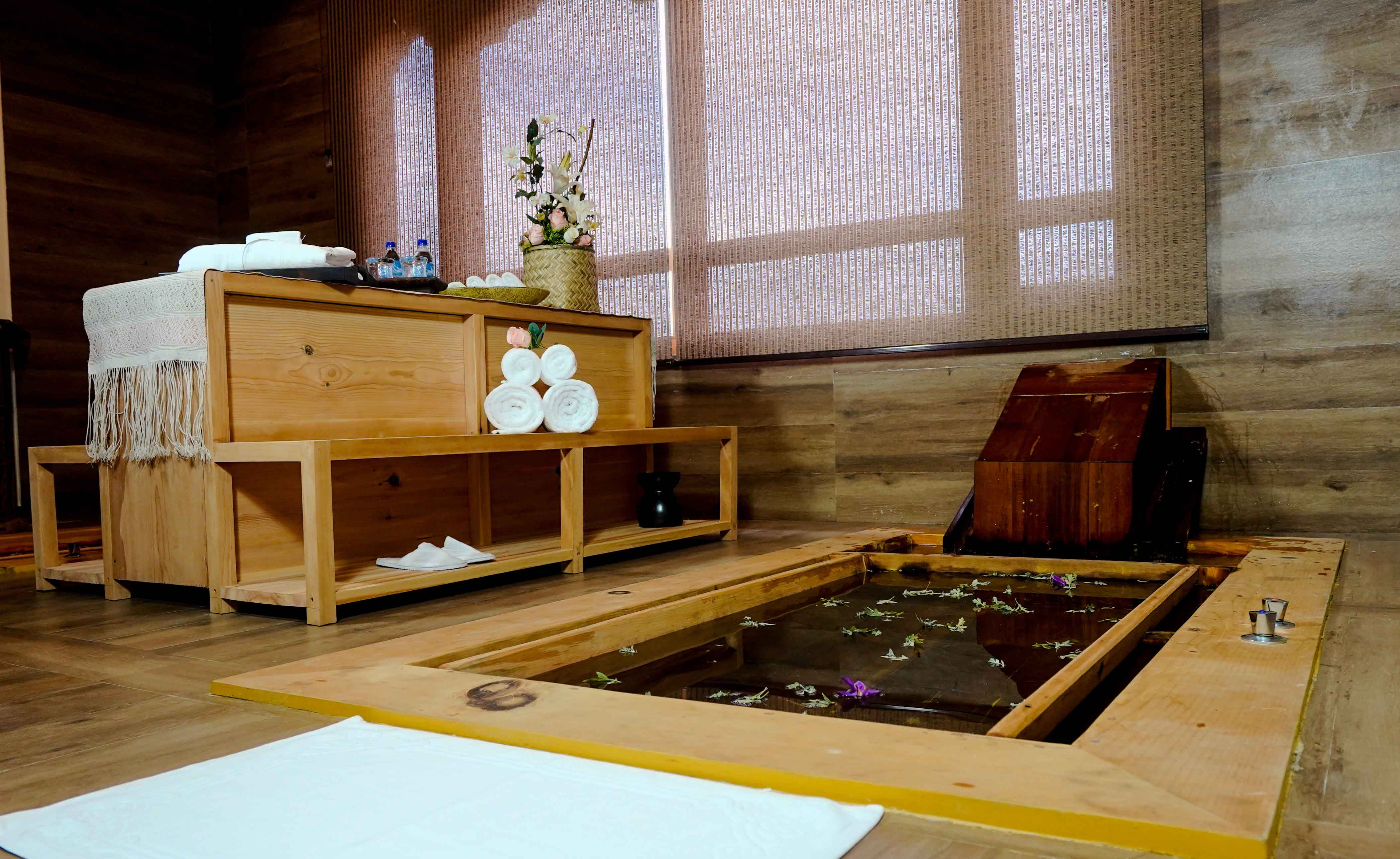 Traditional Bhutanese hot stone bath